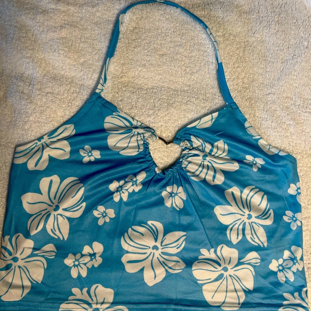 It fits like a M-L, great for club nights, soft & brand new. Never worn